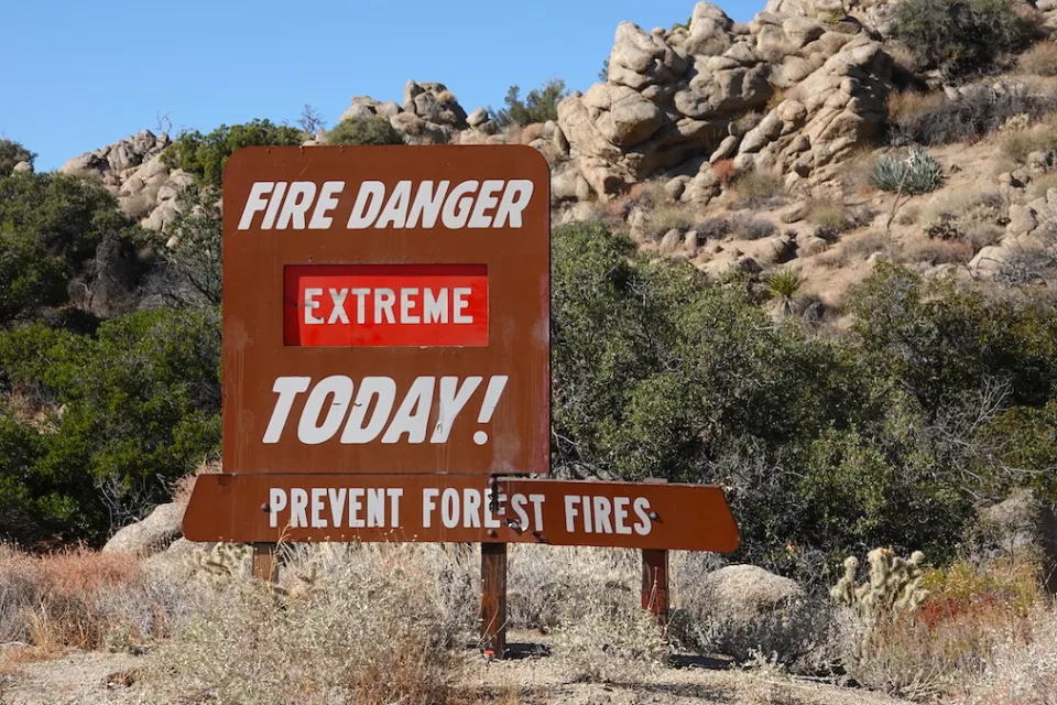 Roadside "Fire Danger Extreme Today!" sign in Cleveland National Forest, California.
